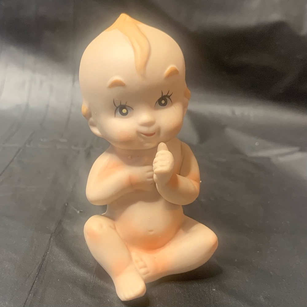 Charming Baby Figurine with Tan Accents
